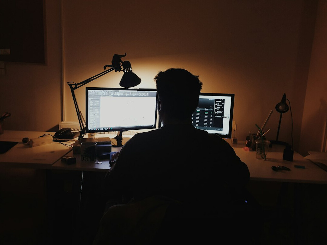 developer coding at desk
